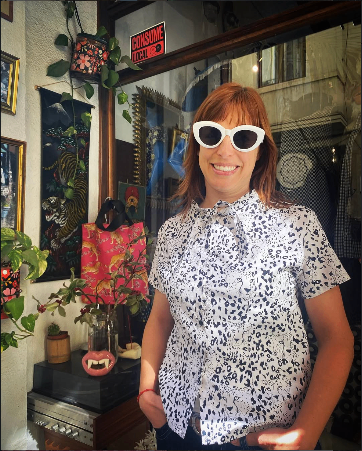 Tania wearing a handmade leopard print shirt