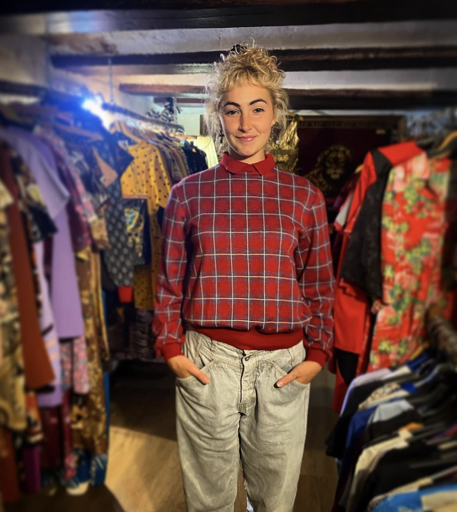 Customer in vintage plaid sweater